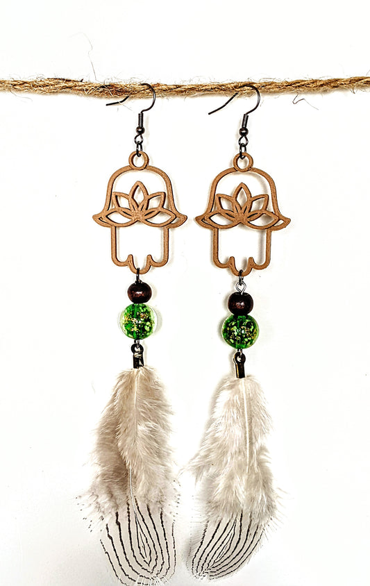 Adamah Earrings - Green & gold, glow in the dark glass bead w/ silver & black striped feathers